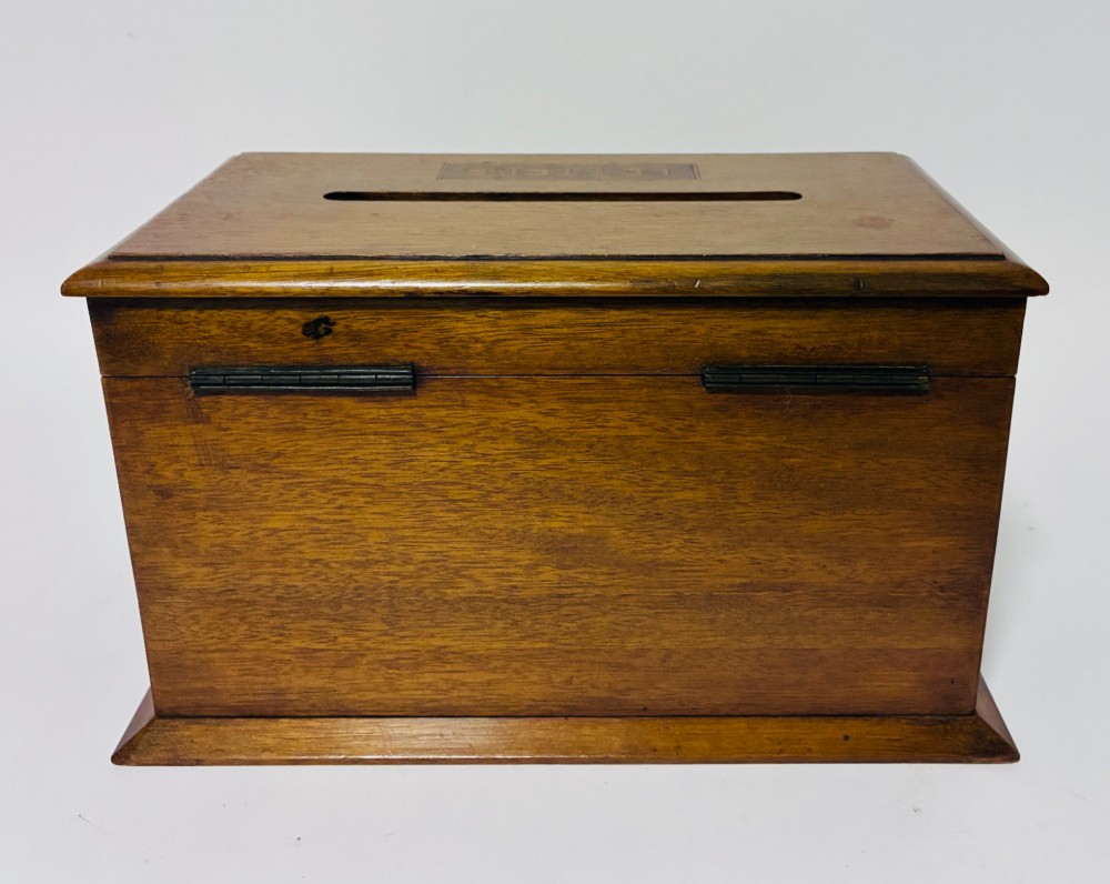 An antique mahogany tabletop letter box featuring a top posting slot, carved LETTERS plaque, key lock mechanism, and bevelled glass front panel. View VIII