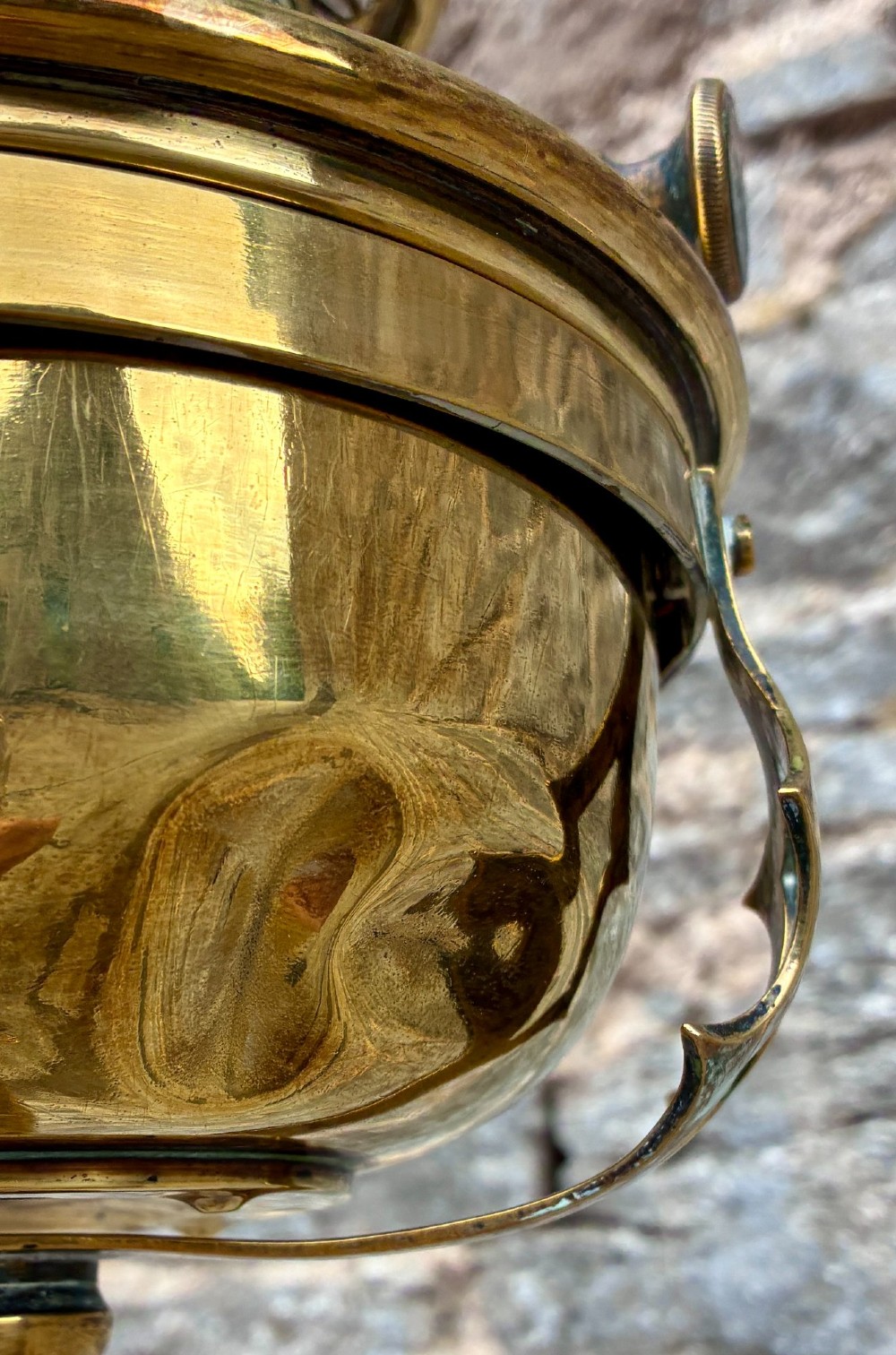 A Victorian brass telescopic floor lamp featuring a ornate tripod base, adjustable vertical stem, and converted oil font fitted with an electrical lamp holder. View IV