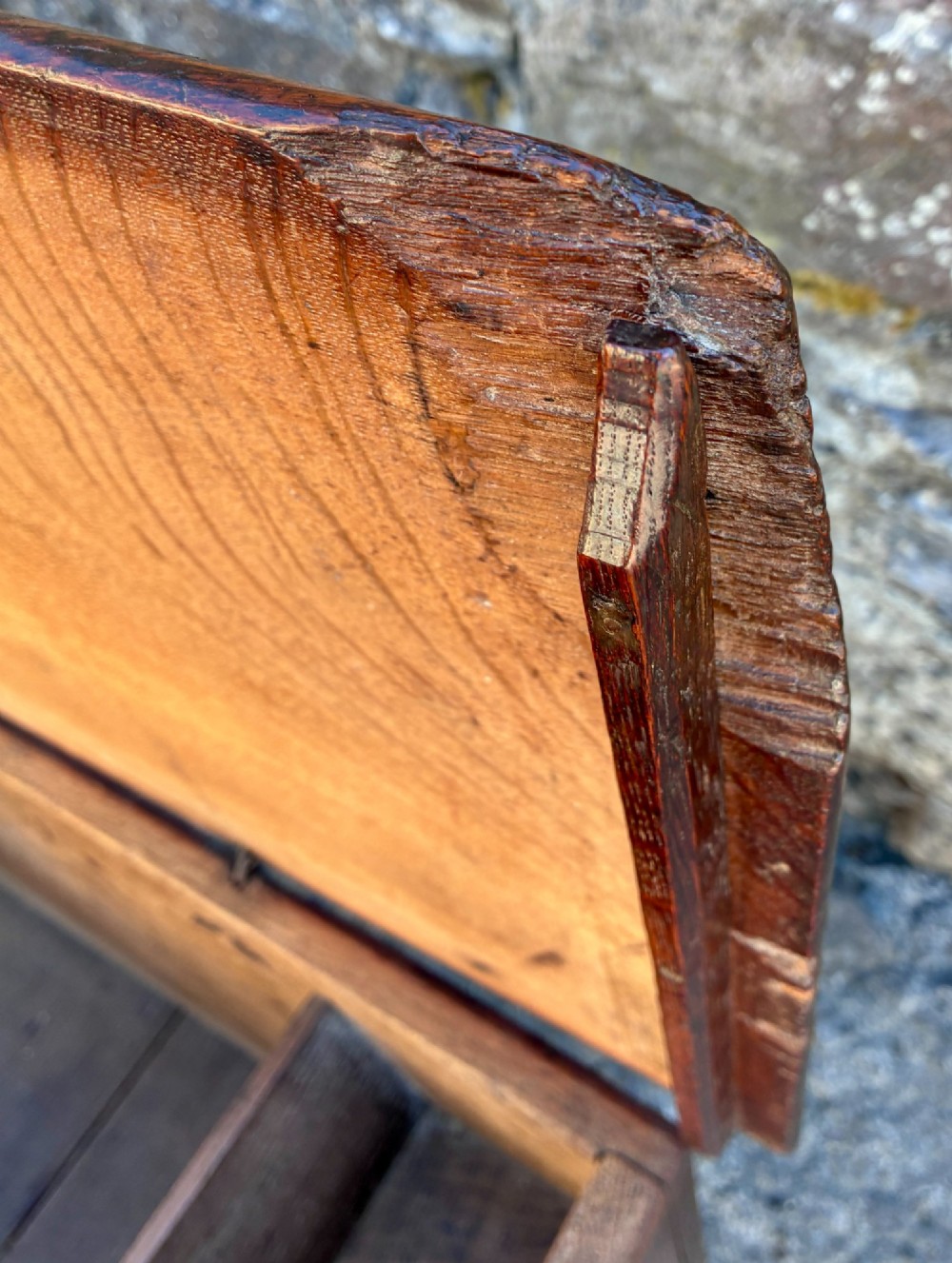 A long early 18th-century oak sword chest featuring a hinged lid, hand-carved initials H R, the date 1724 on the front panel, and a central iron escutcheon. View VIII