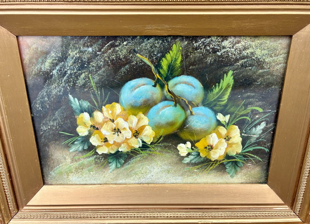 A matching pair of Victorian still life oil paintings depicting plums, primroses, and a bird nest in ornate gold gilded frames. View IV