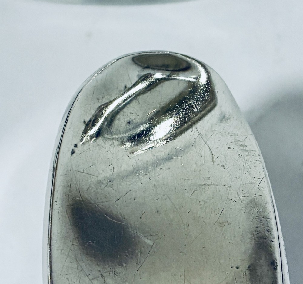 An antique cut-glass hip flask featuring a hallmarked sterling silver collar, chased cap, and a removable silver base cup engraved with the letter C. View XV