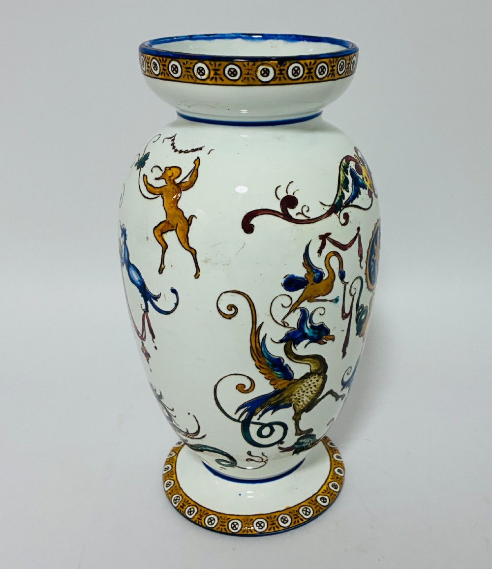 An antique Gien French faience ceramic vase decorated with hand-painted Renaissance grotesque motifs on a white glazed earthenware background. View II
