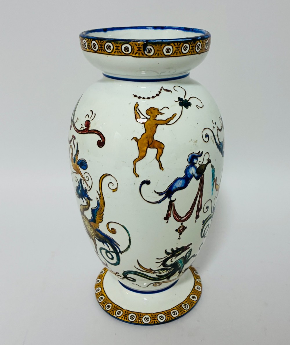An antique Gien French faience ceramic vase decorated with hand-painted Renaissance grotesque motifs on a white glazed earthenware background. View IV