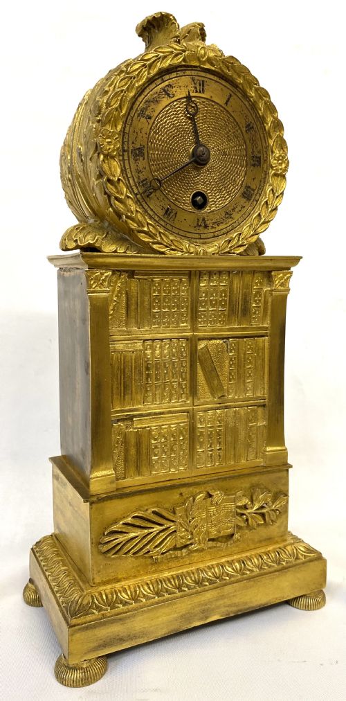 fig 1. Stunning Antique Regency Gilt Bronze Clock Depicting A Bookshelf Silk Suspension