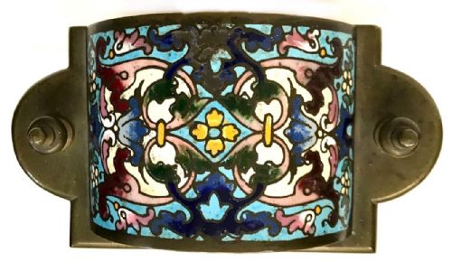 fig 5. A three-piece French late nineteenth-century cloisonne enamel clock garniture set featuring a central arched mantel clock with turned side columns flanked by a pair of matching enamelled candlesticks.