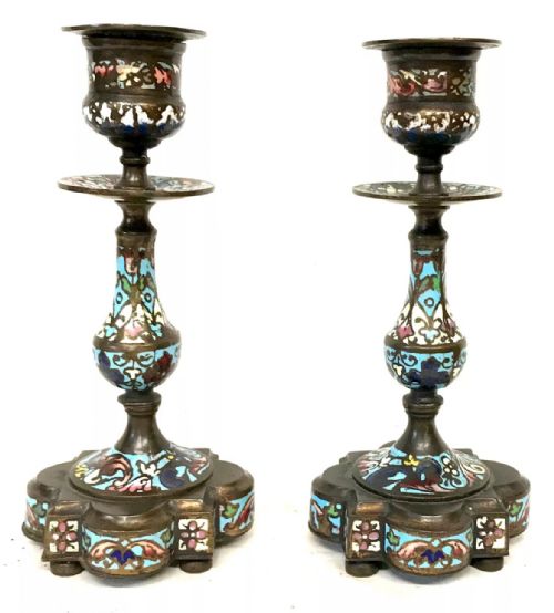 fig 8. A three-piece French late nineteenth-century cloisonne enamel clock garniture set featuring a central arched mantel clock with turned side columns flanked by a pair of matching enamelled candlesticks.