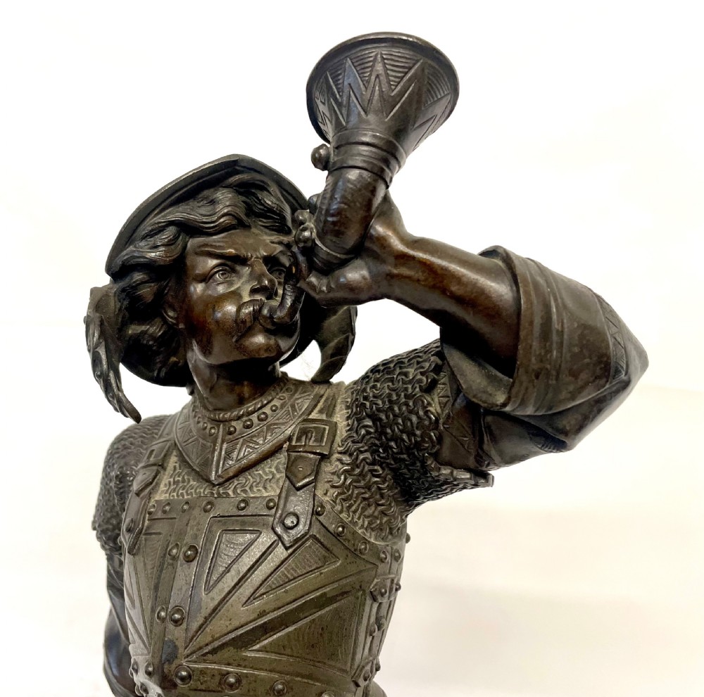 A pair of dark patinated Victorian bronze figures depicting armoured cavalier soldiers standing on circular bases. View IX