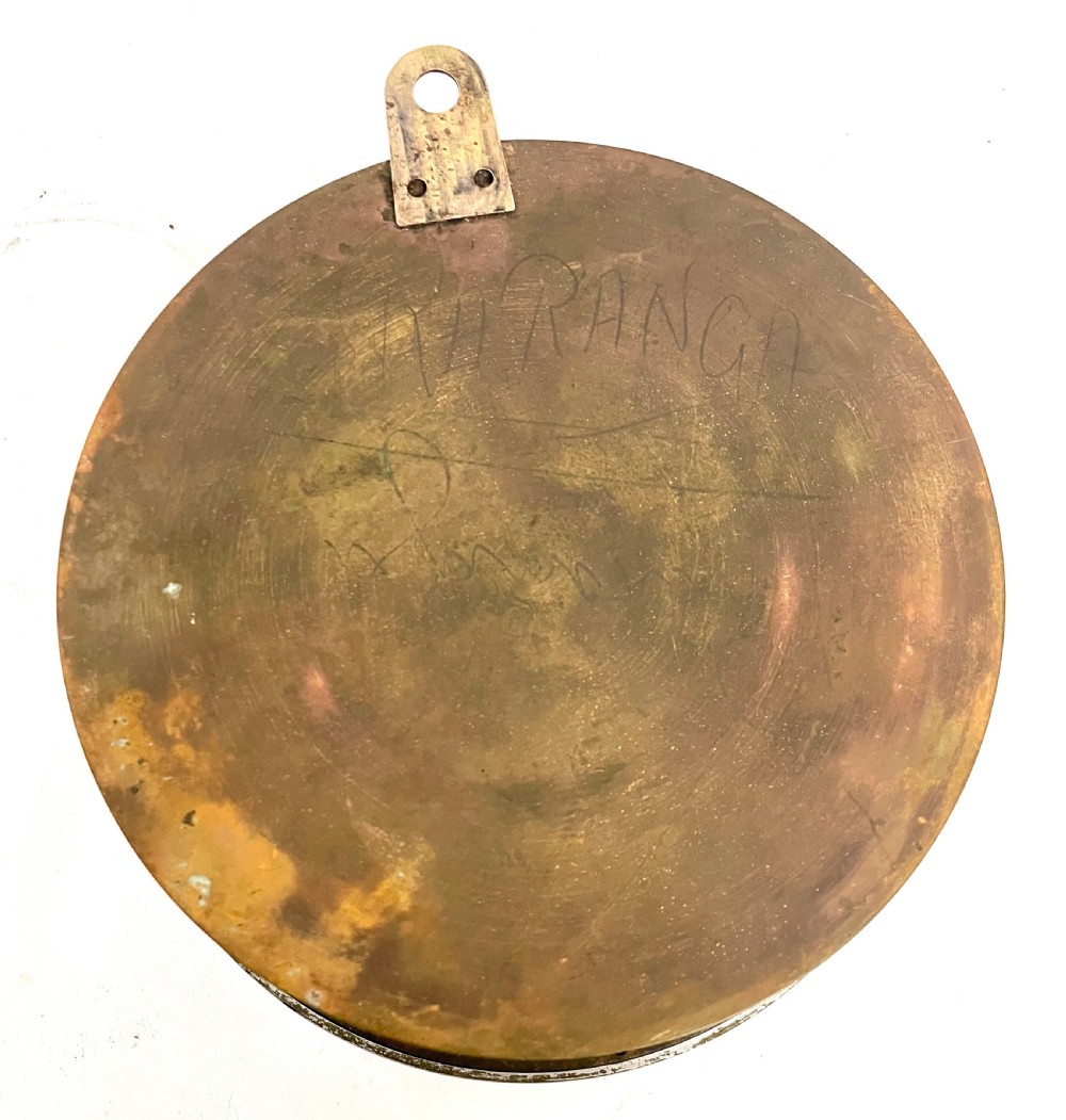 An antique circular nickel-plated brass ships bulkhead clock featuring a cream dial with Roman numerals and a subsidiary seconds dial. View XVI