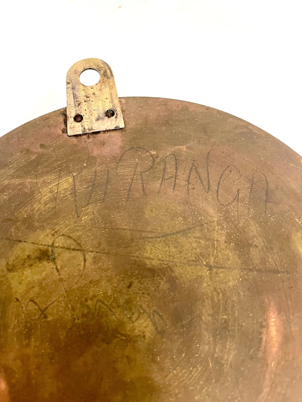 An antique circular nickel-plated brass ships bulkhead clock featuring a cream dial with Roman numerals and a subsidiary seconds dial. View XVII