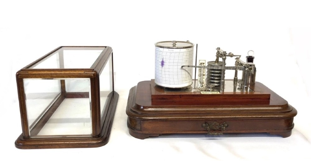 An antique mahogany and glass-cased recording barograph showing internal mechanical brass drums, aneroid pressure cells, and an integrated thermometer above a base drawer. View VIII