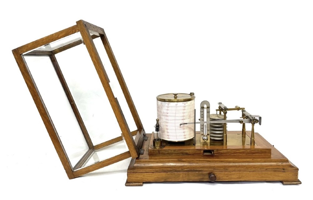 An antique barograph featuring brass recording mechanisms and a paper chart drum enclosed in a glazed oak case with a bottom chart drawer. View XI