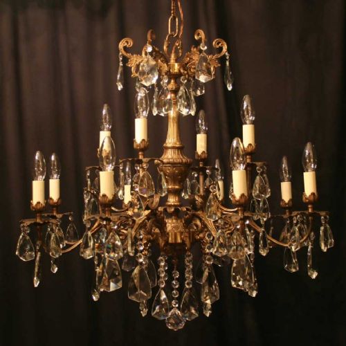 An Italian 12 Light Tiered Antique Chandelier