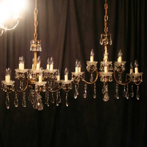 An Italian Pair of 12 Light Antique Chandeliers