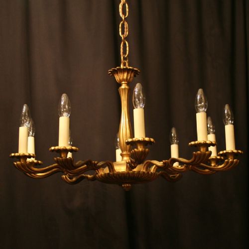 A French 8 Light Gilded Antique Chandelier