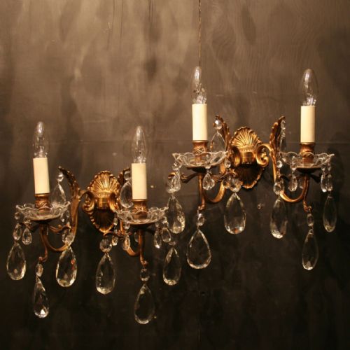 An Italian Pair of Gilded Antique Wall Lights