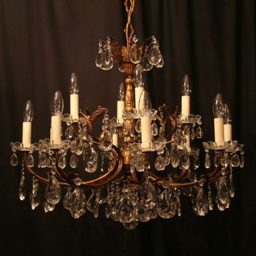 An Italian 12 Light Gilded Antique Chandelier