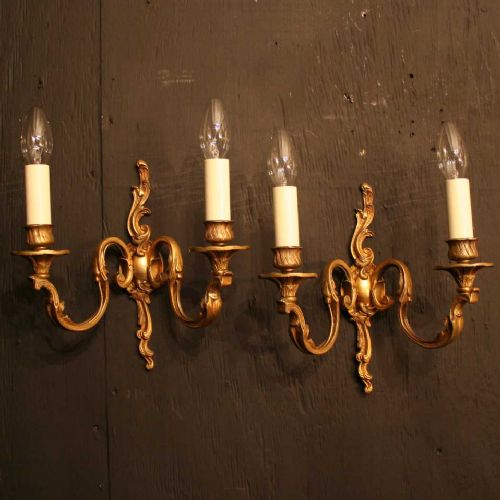 A French Pair of Gilded Rococo Twin Arm Wall Lights