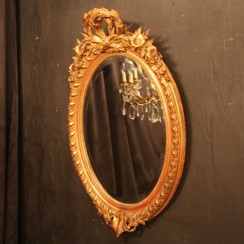A French Giltwood Oval Antique Mirror