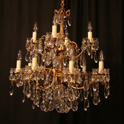 An Italian 12 Light Gilded Antique Chandelier