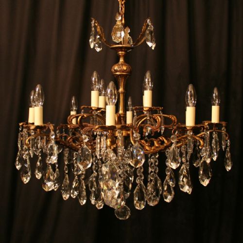 An Italian 12 Light Gilded Antique Chandelier