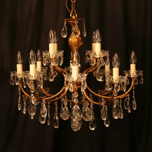 An Italian 12 Light Gilded Antique Chandelier