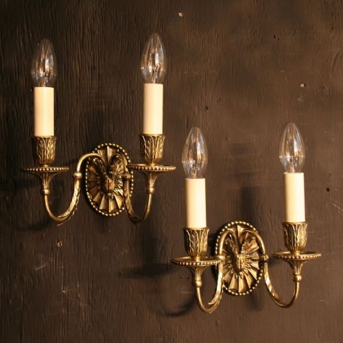 An English Set of 8 Twin Arm Antique Wall Lights