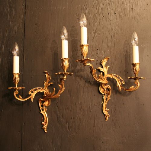 A French Pair of Gilded Twin Arm Antique Wall Lights