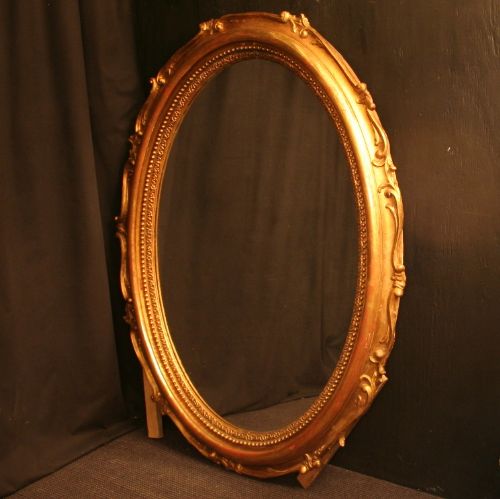 A French Giltwood Oval Antique Mirror