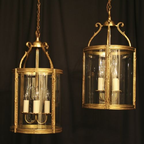 A French Pair of Gilded Antique Hall Lanterns