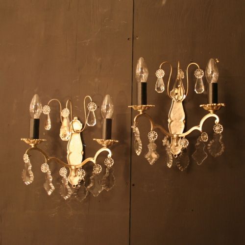 A French Pair of Silvered Cast Brass Antique Wall Lights
