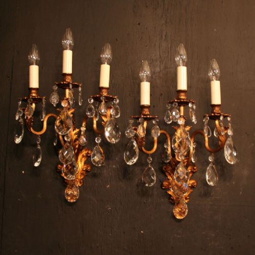 An Italian Pair of Triple Arm Gilded Antique Wall Lights