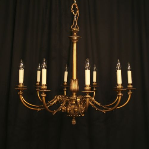 An English 12 Light Gilded Antique Chandelier