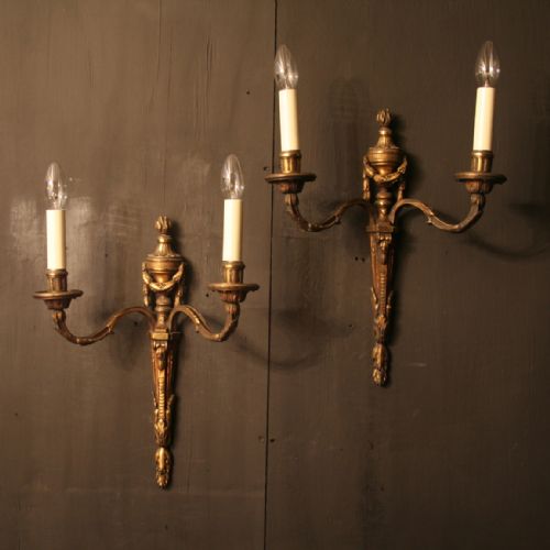 A Large French Pair of Bronze Cast Antique Twin Arm Wall Lights