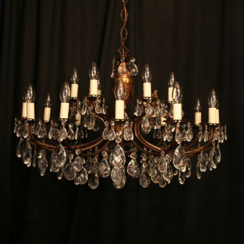 An Italian 18 Light Double Tiered Brass Antique Chandelier