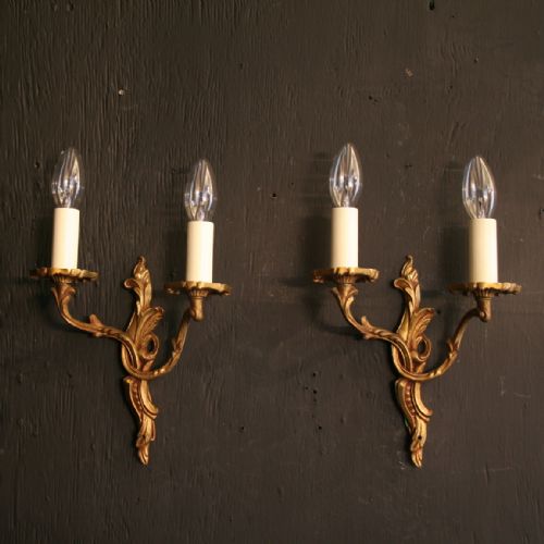 A French Pair of Gilded Cast Brass Twin Arm Antique Wall Lights