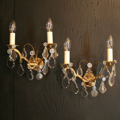 A French Pair of Gilded Cast Twin Arm Antique Wall Lights