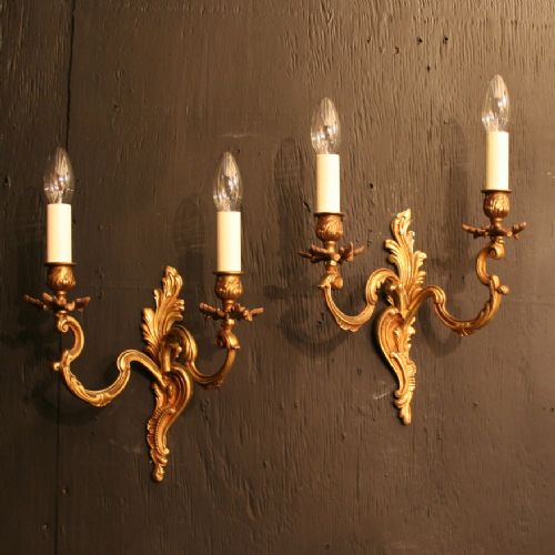 A French Pair of Gilded Brass Twin Arm Antique Wall Lights