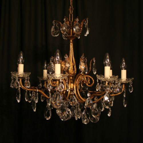 An Italian 8 Light Gilded Cast Antique Chandelier