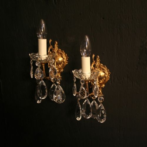 An Italian Pair of Gilded Antique Wall Lights