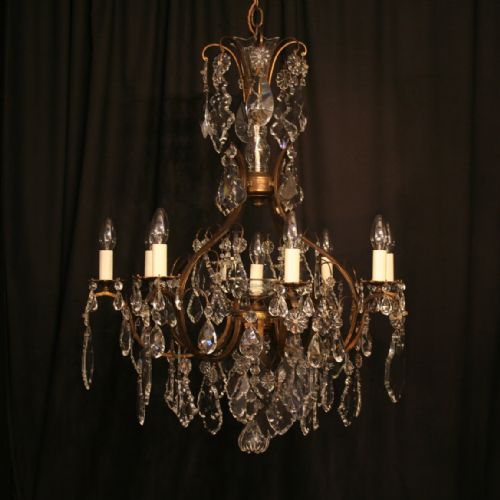A Large French Crystal and Brass 9 Light Antique Cage Chandelier