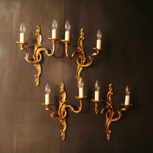 A French Set of Four Gilded Bronze Antique Wall Lights