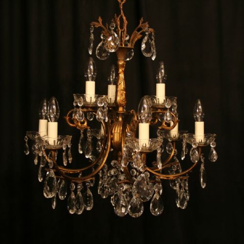 An Italian Gilt & Crystal 9 Light Antique Chandelier