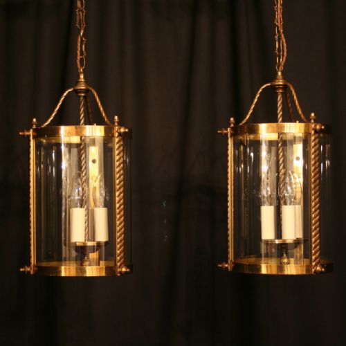 A French Pair of Triple Light Gilded Antique Lanterns
