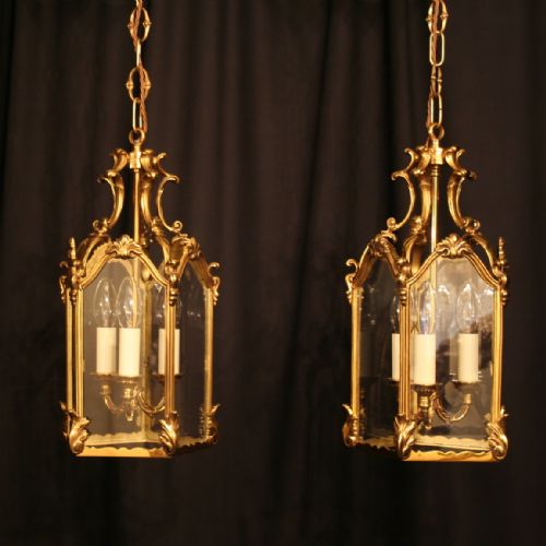 A French Pair of Triple Light Gilded Bronze Lanterns