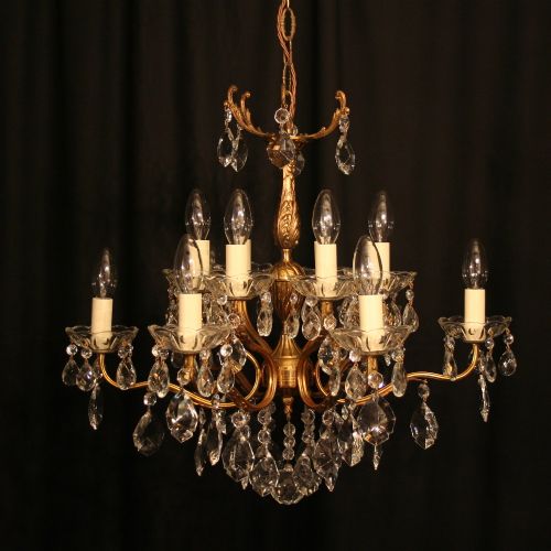 An Italian 12 Light Gilded Antique Chandelier