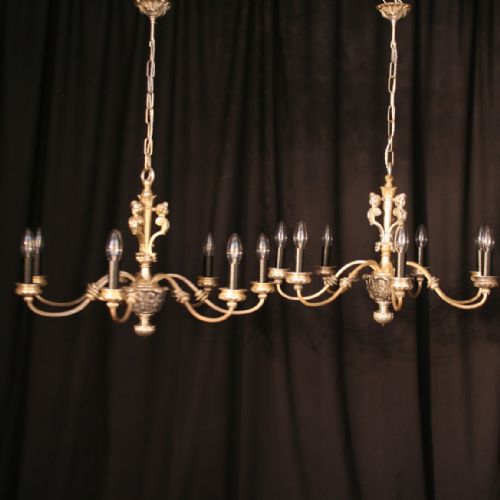 A French Pair of 7 Light Antique Chandeliers