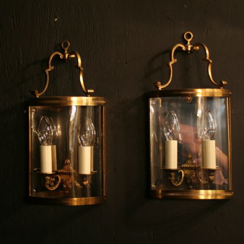 A French Pair of Gilded Antique Half Wall Lanterns