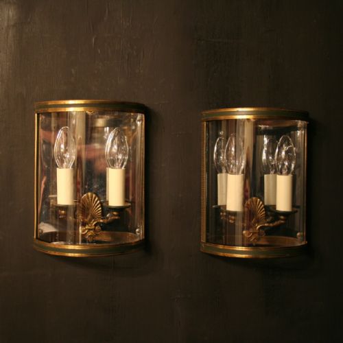 A French Pair of Gilded Antique Convex Half Lanterns