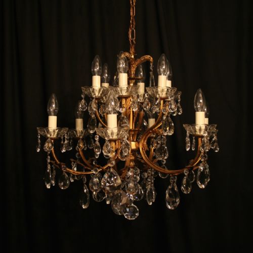 An Italian 12 Light Gilded Double Tiered Antique Chandelier