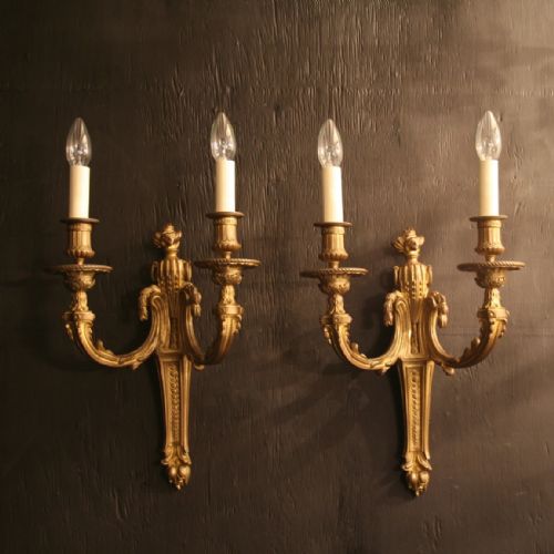 A French Pair of Bronze Antique Wall Lights